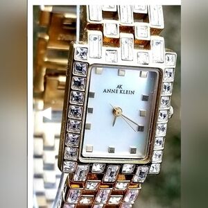 Watch by Anne klein vintage gold with crystal accents and mother of pearl